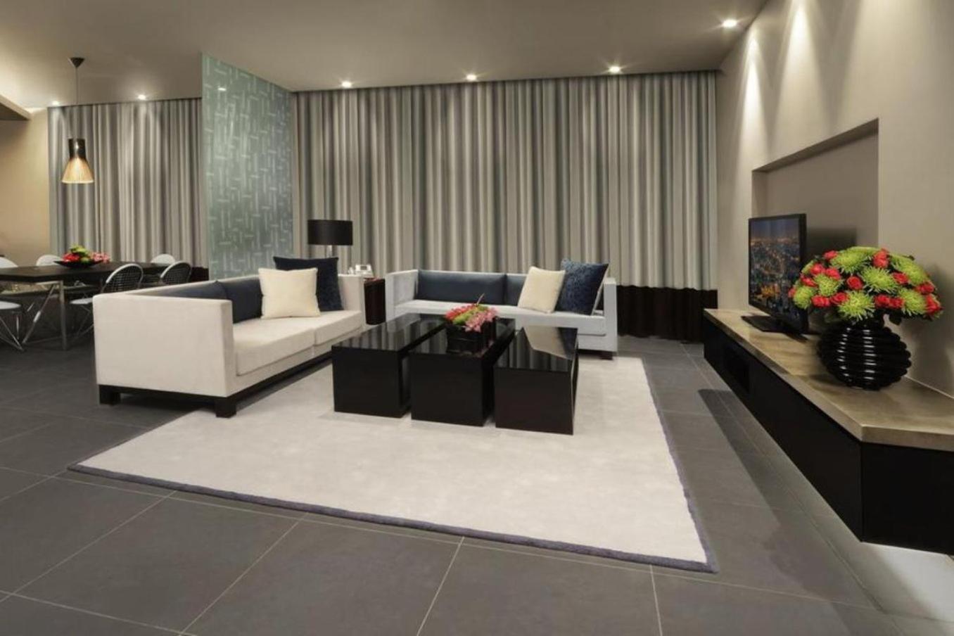 เดอะ บูลาวาร์ด อาร์จาน บาย โรตาน่า Hotel อัมมาน ภายนอก รูปภาพ A living room