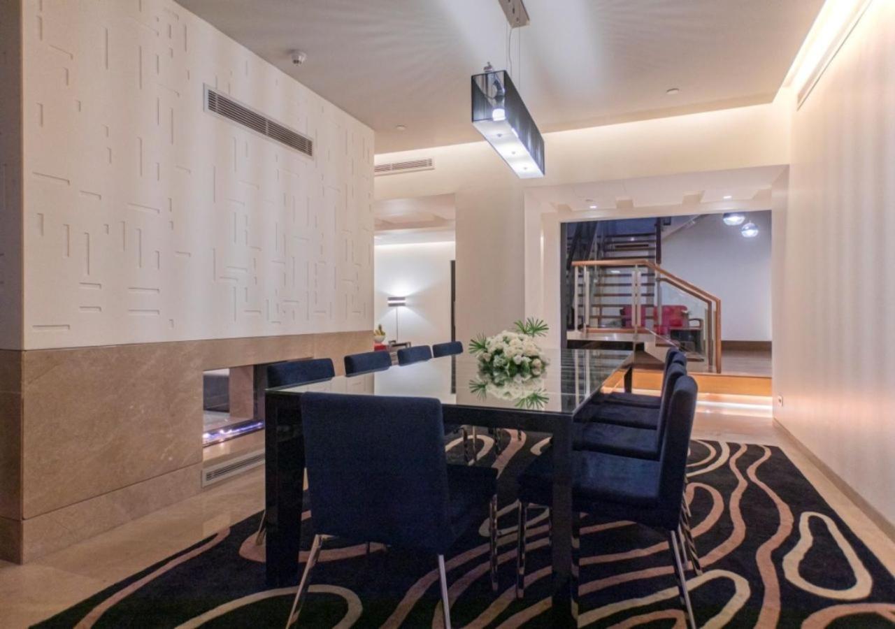 เดอะ บูลาวาร์ด อาร์จาน บาย โรตาน่า Hotel อัมมาน ภายนอก รูปภาพ A modern dining room